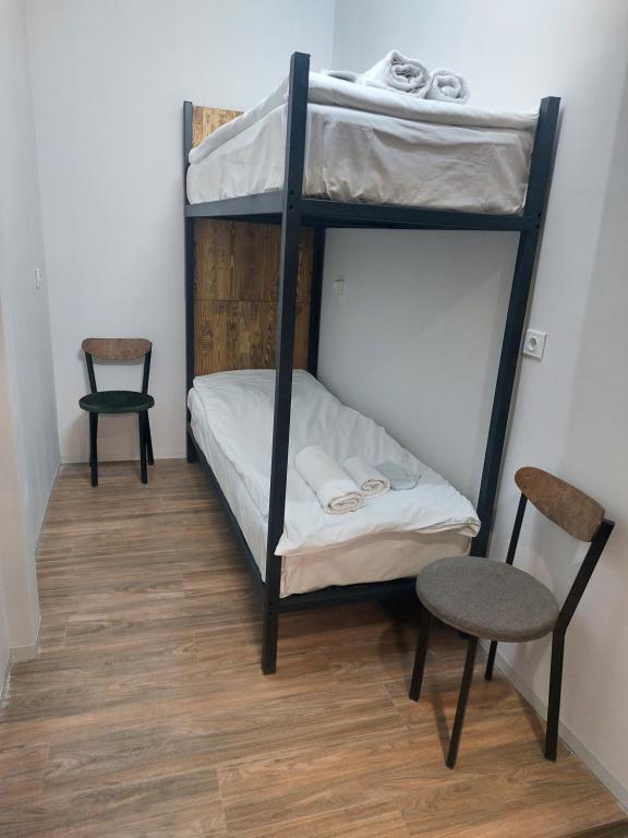 Postel nebo postele na pokoji v ubytování Lori Guest House Hotel