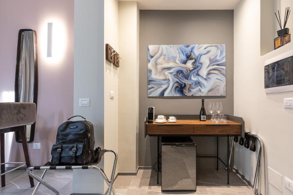 A television and/or entertainment centre at BePlace Apartments in Duomo