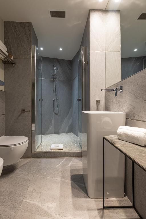 A bathroom at BePlace Apartments in Duomo