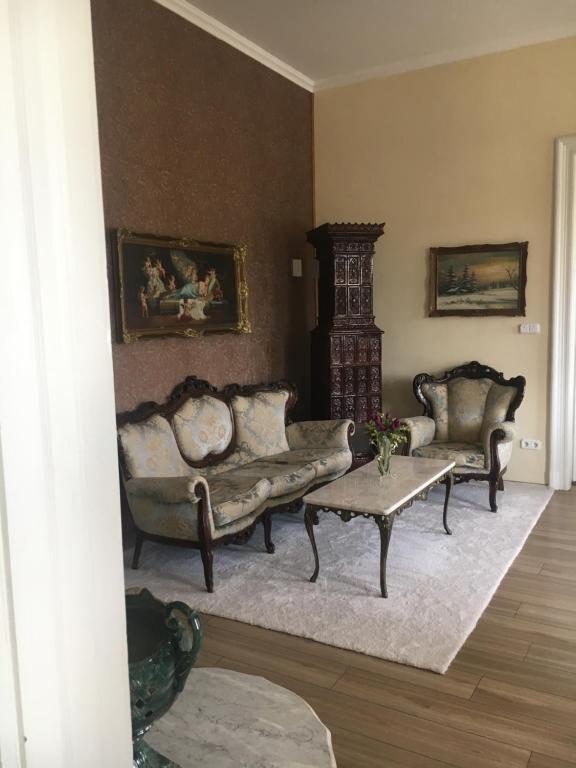 Posedenie v ubytovaní Logod Panorama Apartman