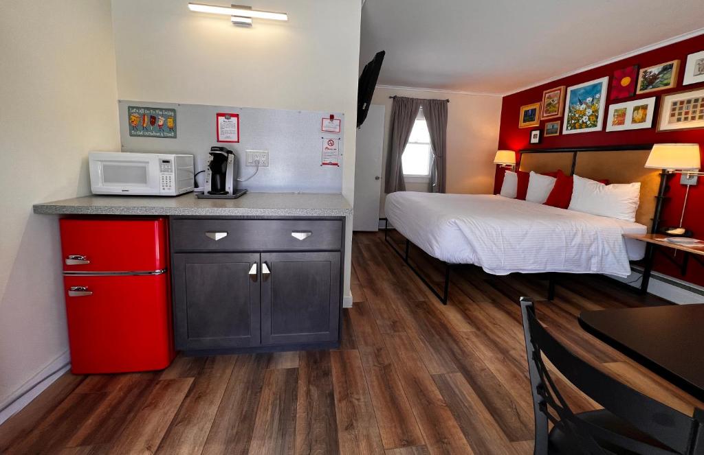 Postel nebo postele na pokoji v ubytování Sleep Woodstock Motel