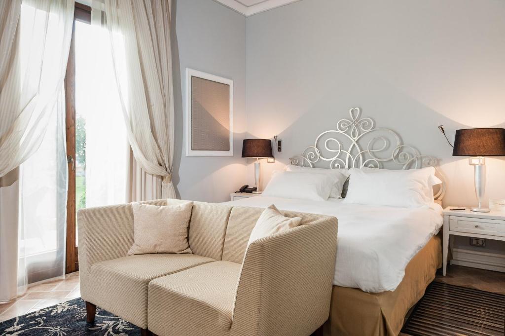 Postel nebo postele na pokoji v ubytování Alla Corte Delle Terme Resort