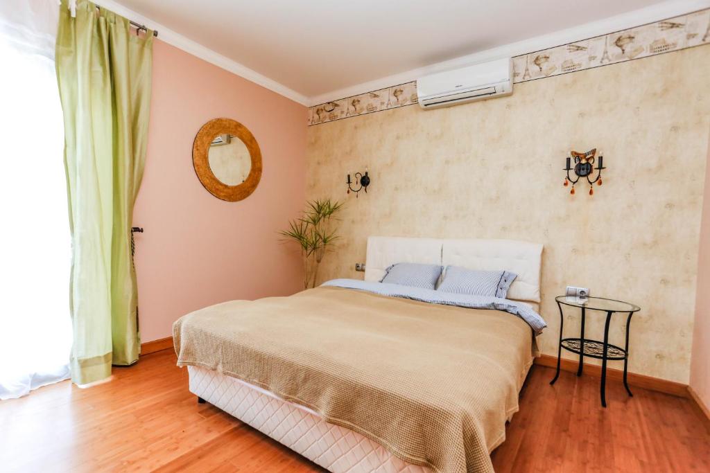 Postel nebo postele na pokoji v ubytování Villa Aurora