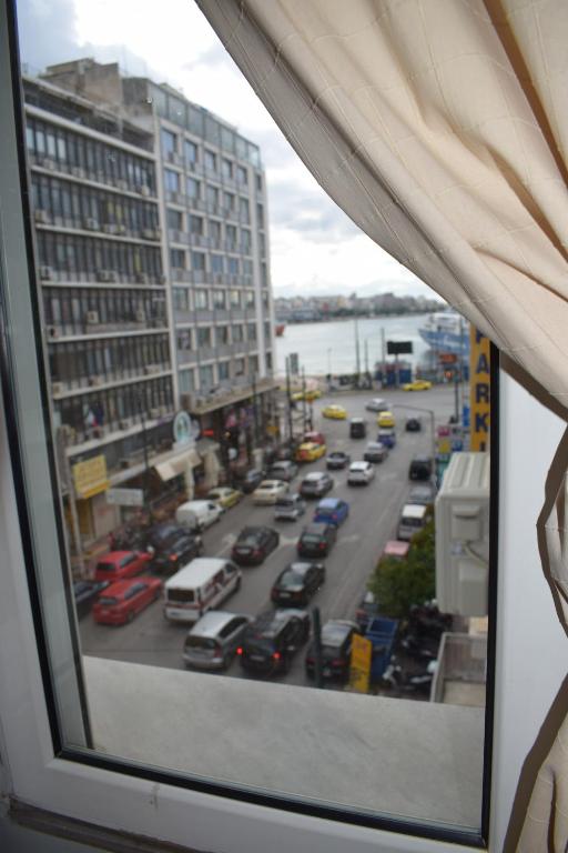 Nespecifikovaný výhled na destinaci Pireus nebo výhled na město při pohledu z hotelu