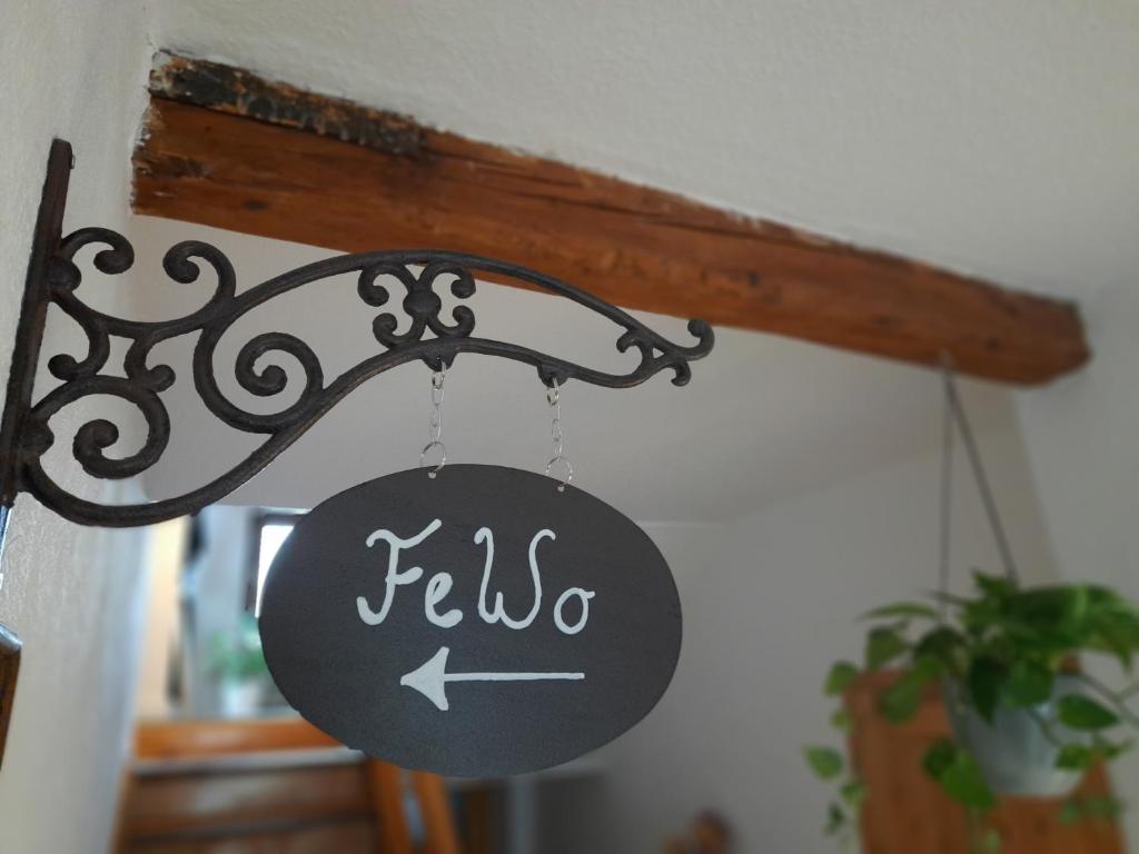 a sign that says fedo hanging from a rack at Ferienwohnung Sophie - perfekt mit Kind und Kegel in Eitelborn