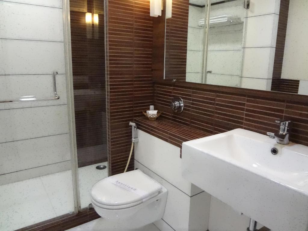 Koupelna v ubytování Shantai Hotel