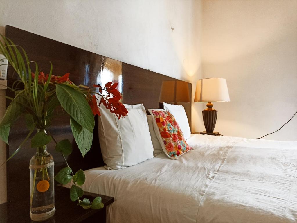 Postel nebo postele na pokoji v ubytování Casa De Los Pájaros - B&B