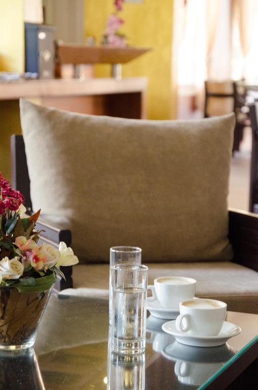 Posezení v ubytování Athos Hotel