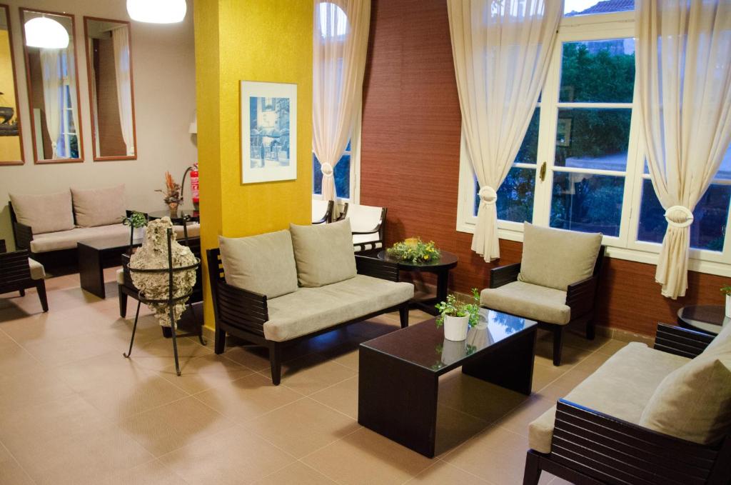 Posezení v ubytování Athos Hotel