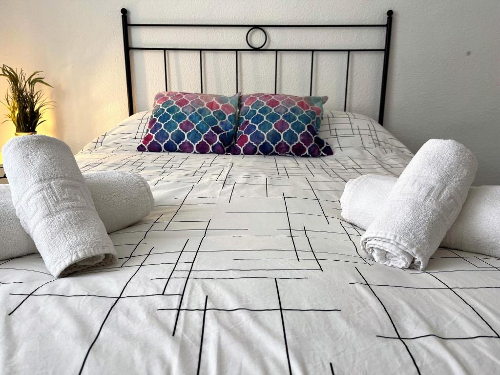 Postel nebo postele na pokoji v ubytování Apartamento Córdoba Palace