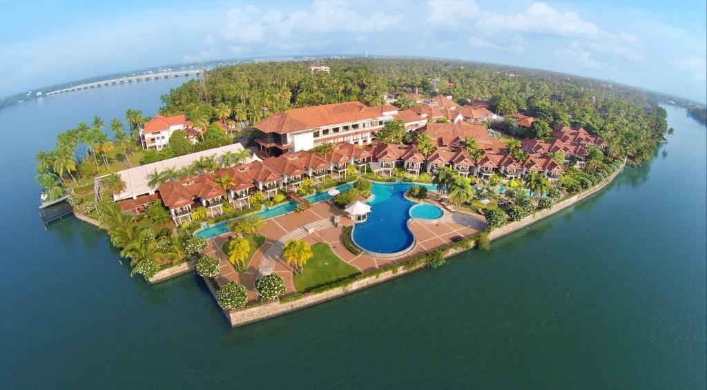 an aerial view of a home on an island in the water at Ramada Resort by Wyndham Kochi in Cochin