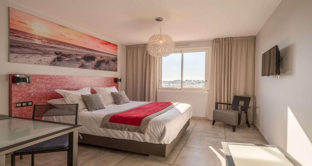 Postel nebo postele na pokoji v ubytování Sure Hotel by Best Western Beziers Le Monestie