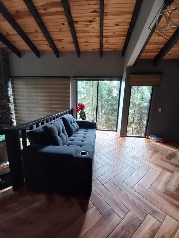 Posezení v ubytování Cabaña Bagheera