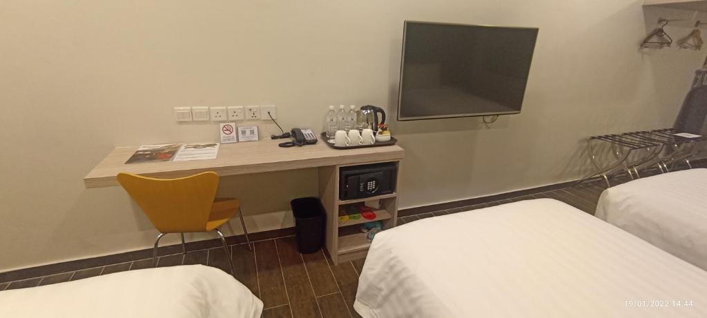 Postel nebo postele na pokoji v ubytování The Klagan Hotel