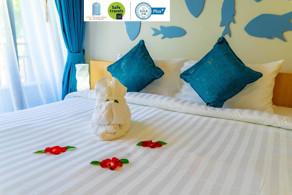 Postel nebo postele na pokoji v ubytování Golden Paradise Hotel - SHA PLUS