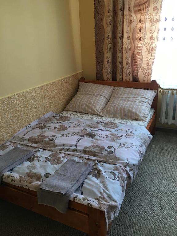 Postel nebo postele na pokoji v ubytování У Ондраша