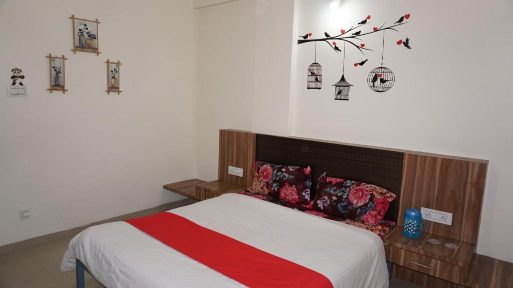 Posteľ alebo postele v izbe v ubytovaní Happy Stay, Panchgani