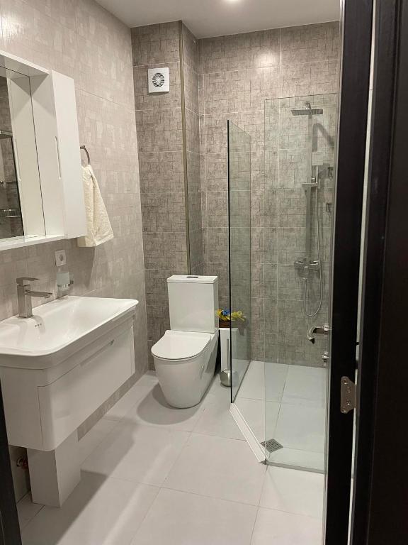 Koupelna v ubytování Apartment Qumli