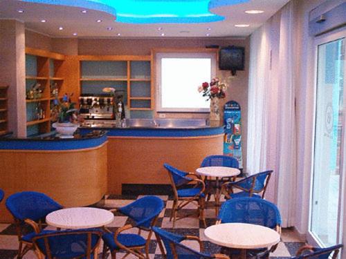 TV a/nebo společenská místnost v ubytování Hotel Belmar