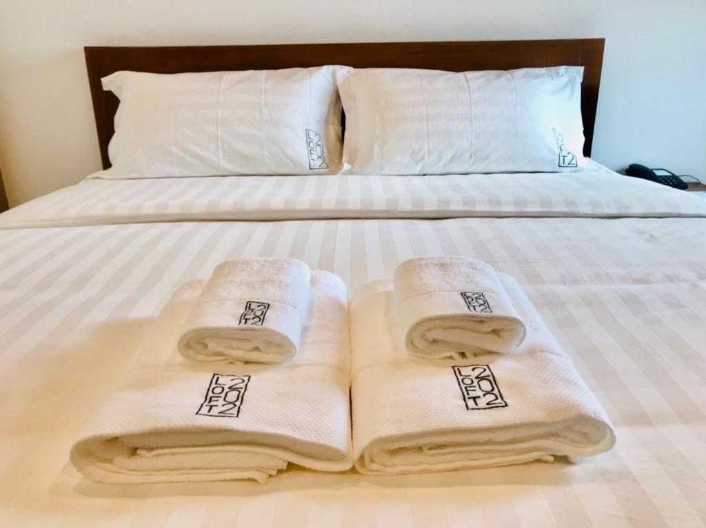 Postel nebo postele na pokoji v ubytování Loft 202 Hotel