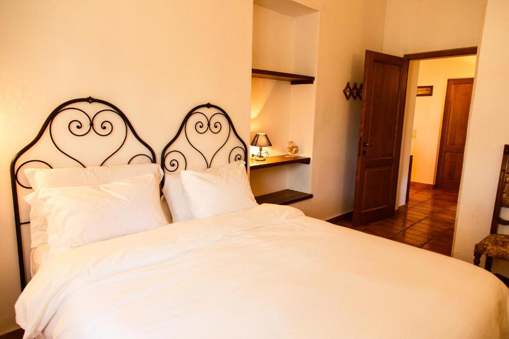A bed or beds in a room at Poggio Verde