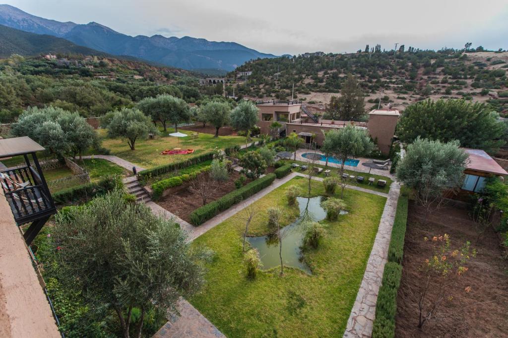 an aerial view of a garden with a pool at Ouirgane Ecolodge in Ouirgane
