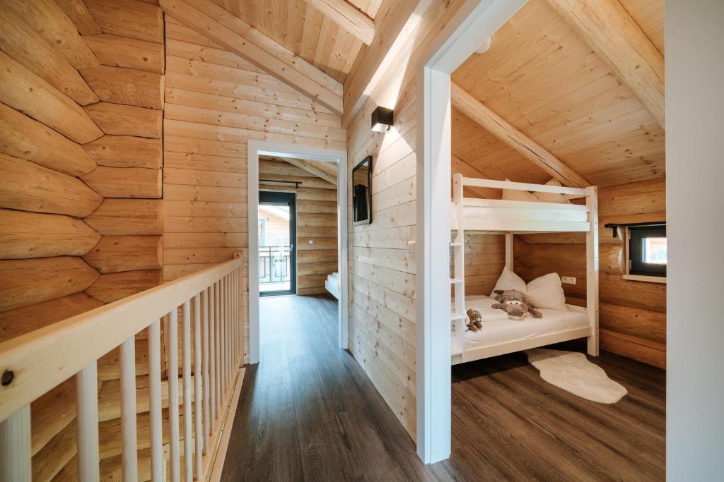 Poschodová posteľ alebo postele v izbe v ubytovaní Clofers Leisure Lodges Jenig