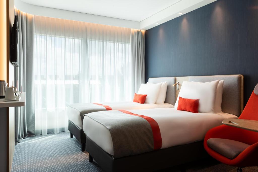 Postel nebo postele na pokoji v ubytování Holiday Inn Express - Almere by IHG