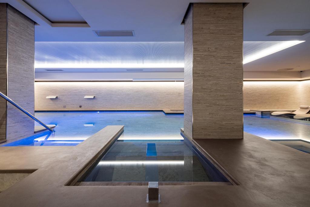 Bazén v ubytování Smy Carlos V Wellness & Spa Alghero nebo v jeho okolí