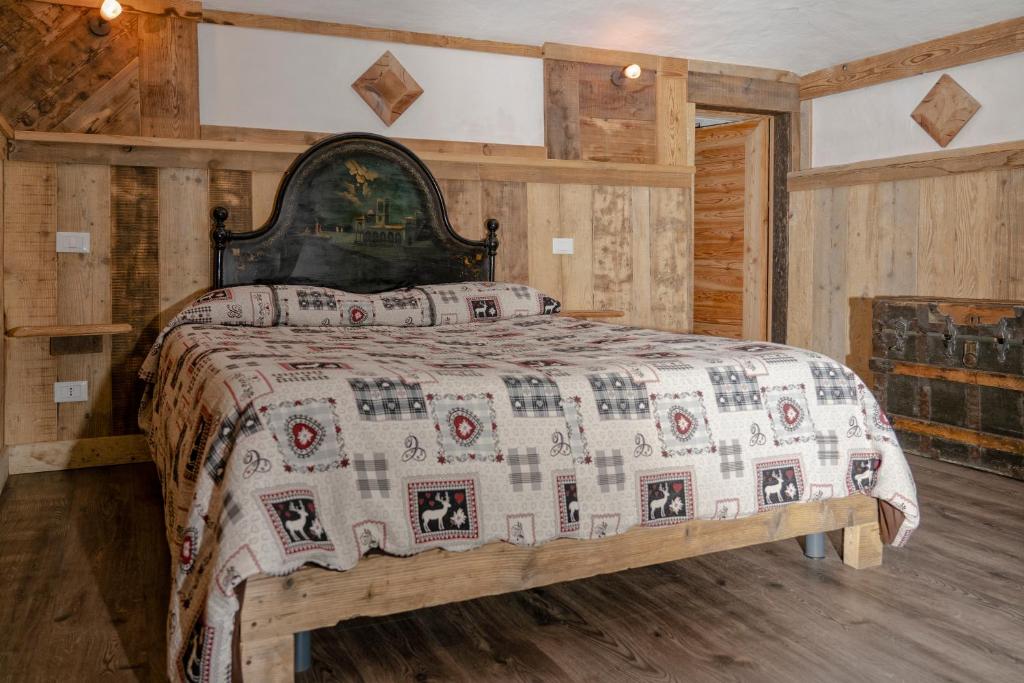 Postel nebo postele na pokoji v ubytování Agriturismo B&B Chèvres à Cheval