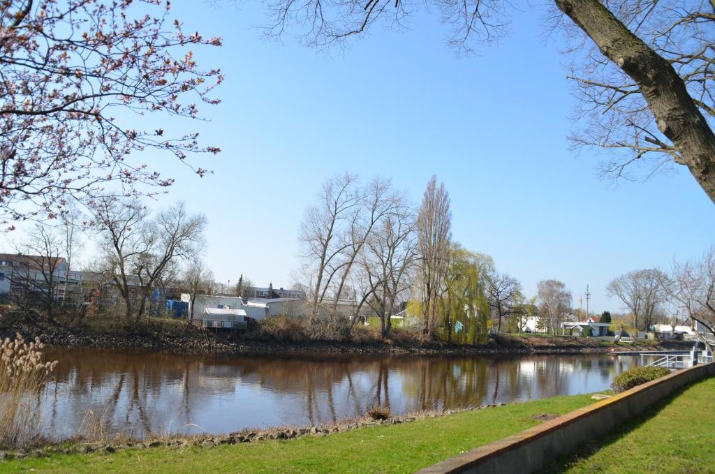 a body of water with trees and a river at MK Hostel Bremen in Bremen