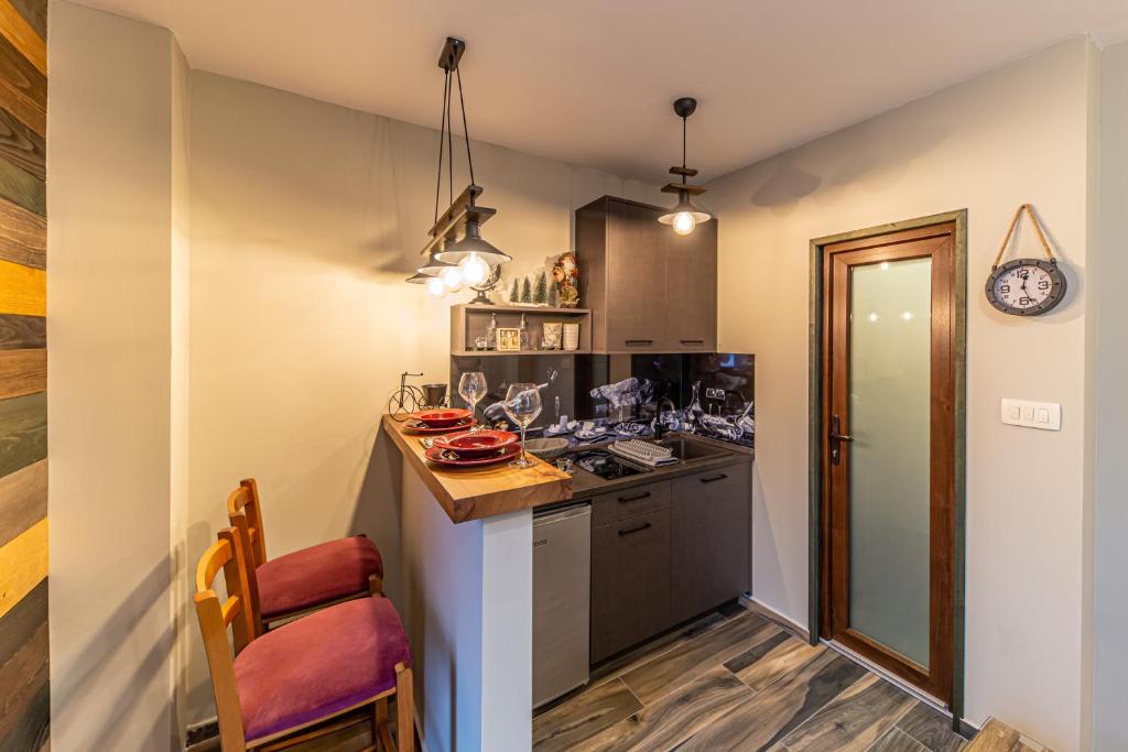 Kuchyň nebo kuchyňský kout v ubytování Apartman_PidžuN