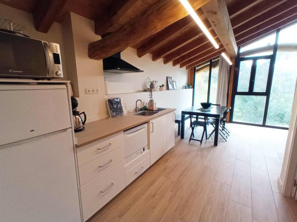 Kuchyň nebo kuchyňský kout v ubytování Mokorroko Borda Hostal Rural