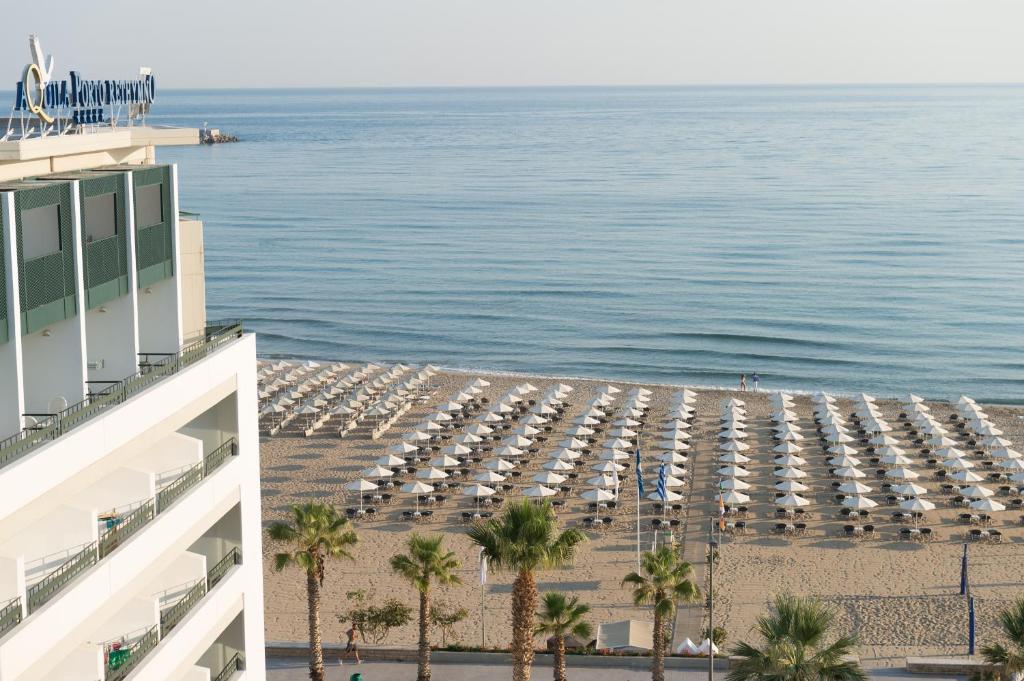 a view of the ocean from a building at Aquila Porto Rethymno in Rethymno Town