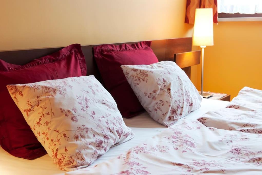 Posteľ alebo postele v izbe v ubytovaní Trinity Apartment