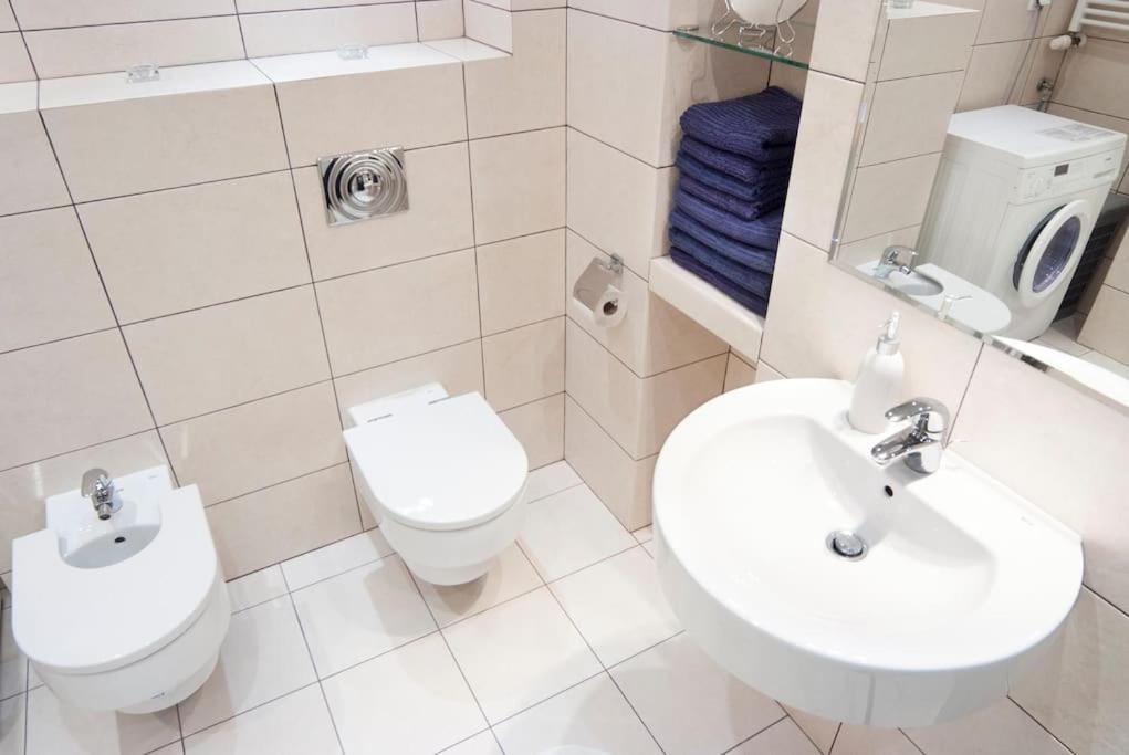Kúpeľňa v ubytovaní Trinity Apartment