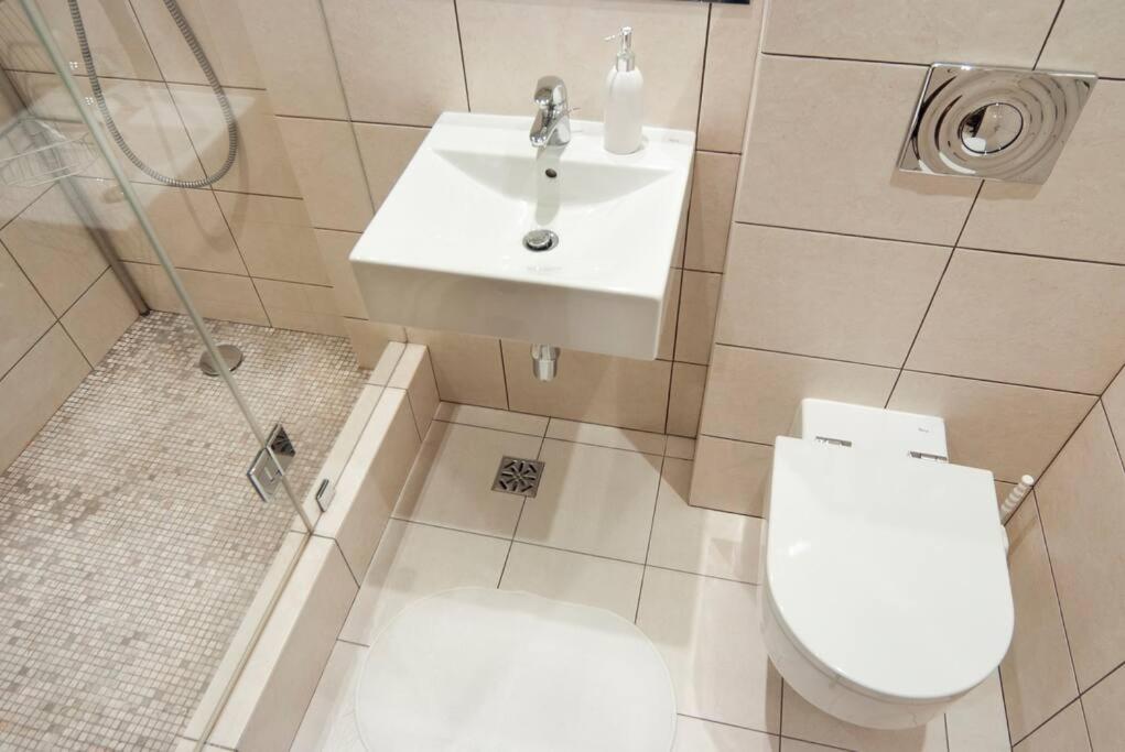 Kúpeľňa v ubytovaní Trinity Apartment