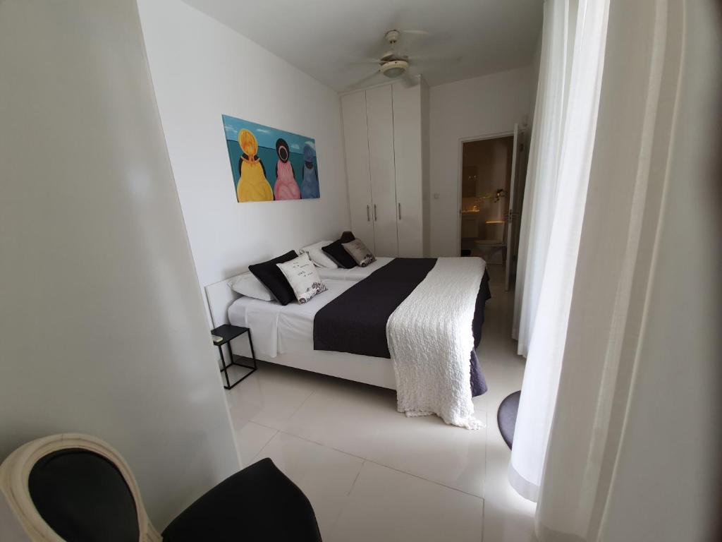 Postel nebo postele na pokoji v ubytování C APARTMENT at JAN THIEL Curacao