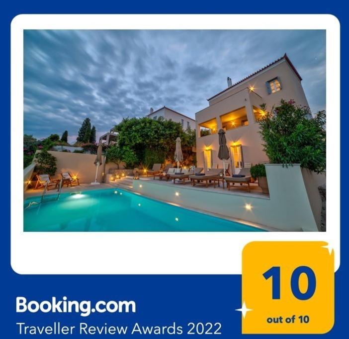 una imagen de una casa con piscina en View-topia Amazing View, Private Pool, Close to the center. en Spetses