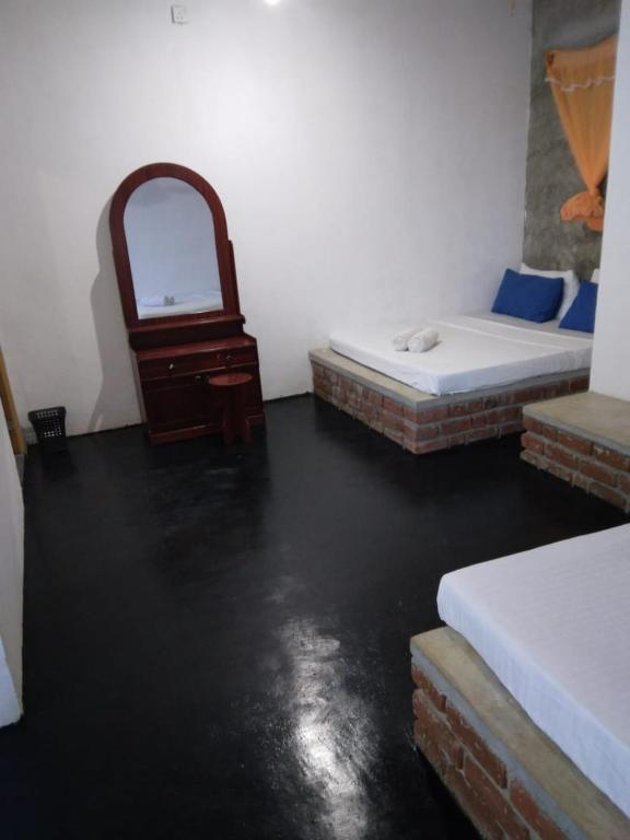 Postel nebo postele na pokoji v ubytování Rithu Homestay