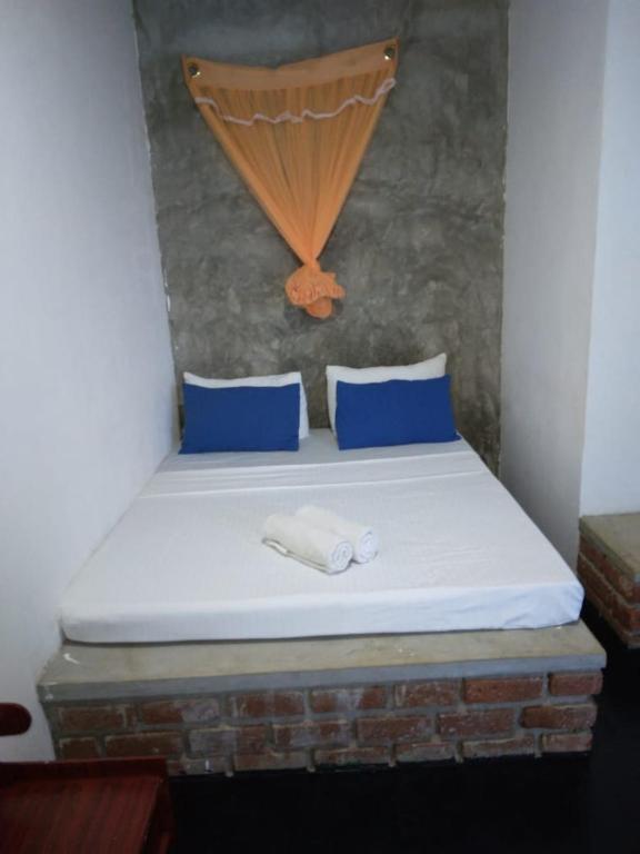 Postel nebo postele na pokoji v ubytování Rithu Homestay
