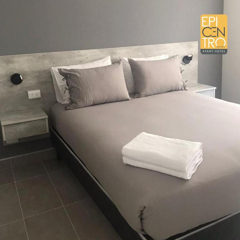 Voodi või voodid majutusasutuse Epicentro Suites Apart Hotel - Temuco toas