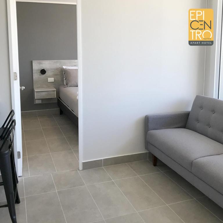 Voodi või voodid majutusasutuse Epicentro Suites Apart Hotel - Temuco toas