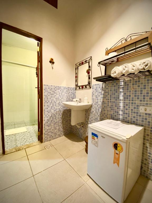 Koupelna v ubytování MAI Chameguin Hospedagens Paraty