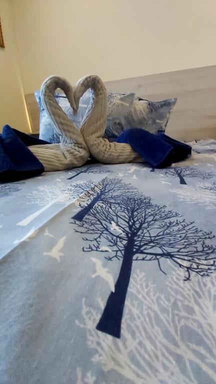 Postel nebo postele na pokoji v ubytování Guesthouse Pumpalovi