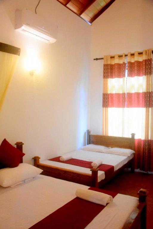 Postel nebo postele na pokoji v ubytování Chipmunk Home Stay