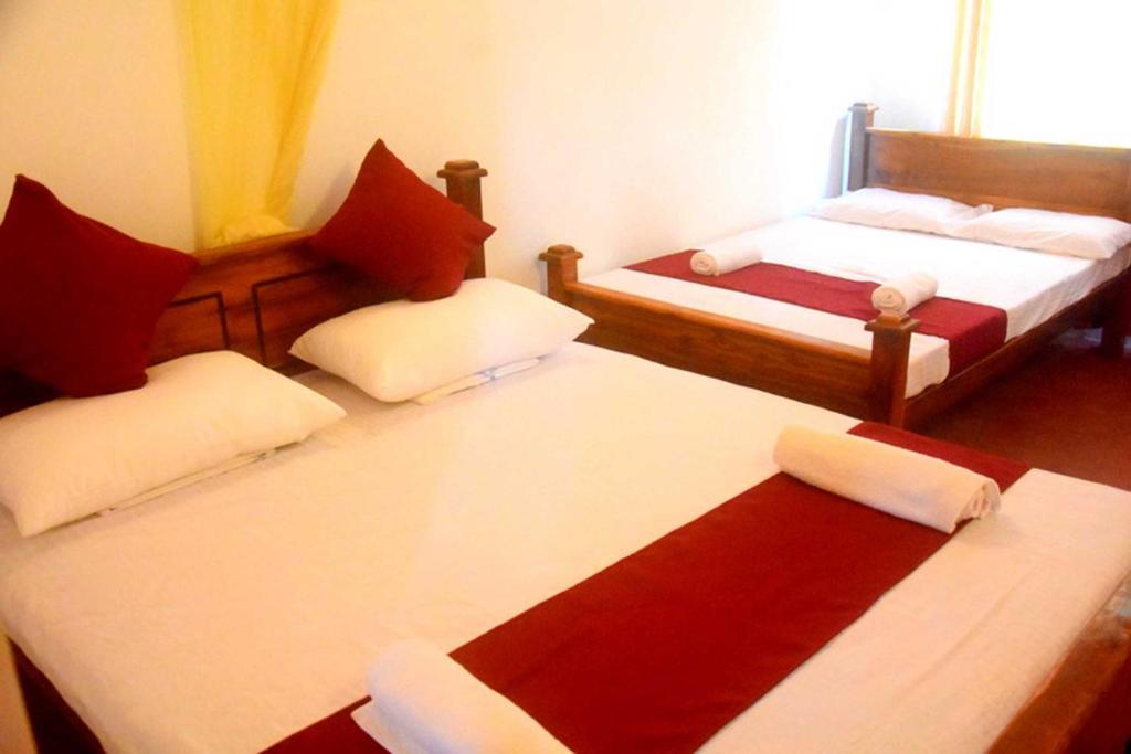 Postel nebo postele na pokoji v ubytování Chipmunk Home Stay