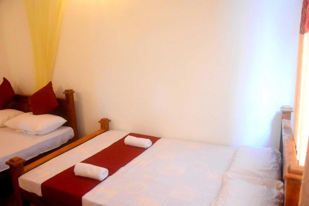 Postel nebo postele na pokoji v ubytování Chipmunk Home Stay