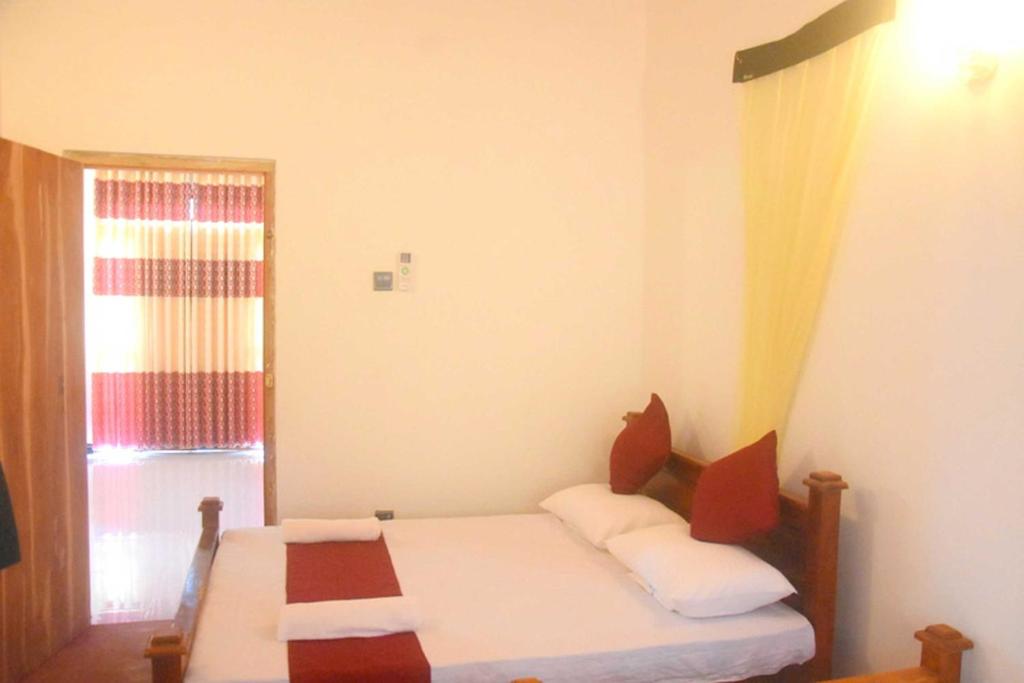 Postel nebo postele na pokoji v ubytování Chipmunk Home Stay