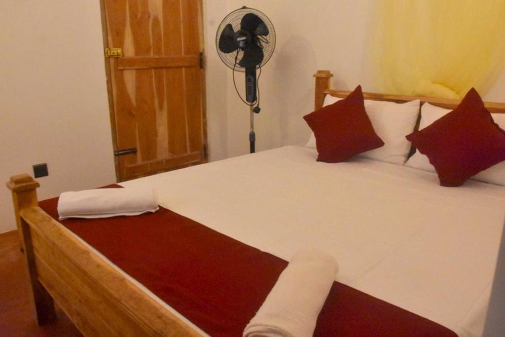 Postel nebo postele na pokoji v ubytování Chipmunk Home Stay